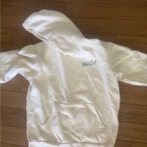 Bird Rock surf shop cream hoodie with green Logo